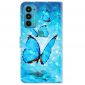 Housse Motorola Moto E20 / E30 / E40 papillons bleus scintillants