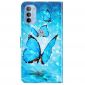 Housse Motorola Moto G31 / Moto G41 papillons bleus scintillants