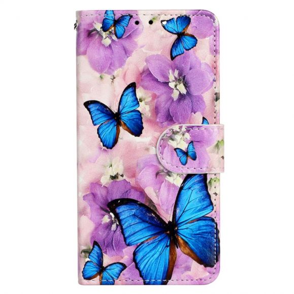 Housse iPhone 14 Pro papillons bleus et fleurs