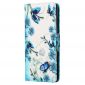 Housse iPhone 14 fleurs bleues et papillons