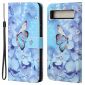 Housse Google Pixel 7a Papillon et fleurs bleues